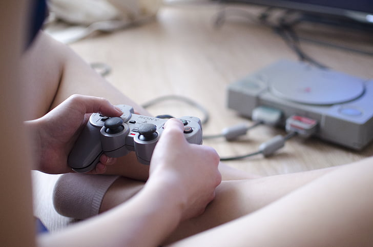 PS1 Collecting - Person holding PS! Controller